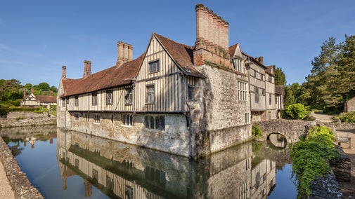 The south east corner of the house reflected on the moat